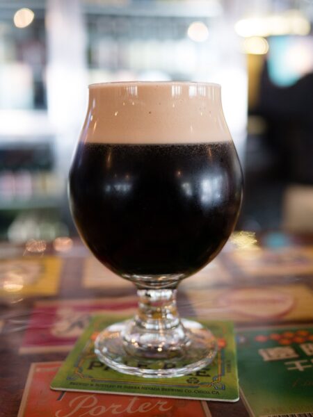 dark stout beer in balloon glass